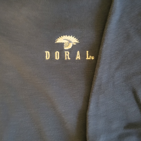 Greg Norman Men's Medium Golf Shirt Blue w/ DORAL Golf Course Logo - Picture 3 of 5